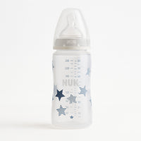 NUK Babyflasche 300 ml mit beigem Schraubring und Sternen-Dekor; PP BPA-frei, First Choice+ System, Silikon-Trinksauger Größe M 0–6 Monate für Milchnahrung; auslaufsicher, gut ablesbare Skala – geeignet ab Geburt, schönes Geschenk zur Geburt.